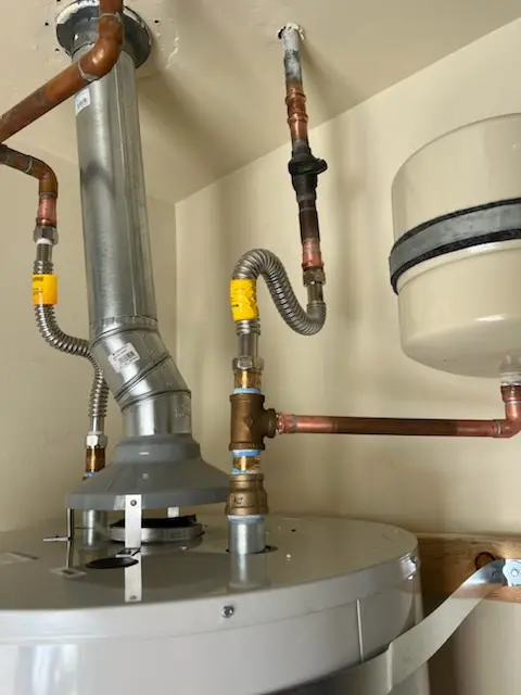 Water heater installation and plumbing repair in Algoma